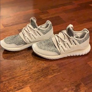 Men’s adidas tubular shoes.